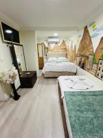 Camera Tripla con Vista Giardino