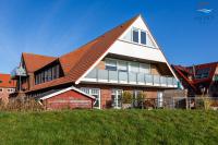 Landhaus Gertrude 109 - Wohnung Hafenblick - B&B Juist