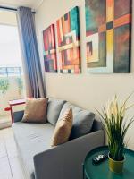 Departamento con Piscina y Parking, a Pasos del Estadio Nacional, Metro y Campus Universitario San Joaquín - Chambres d’hôtes Santiago