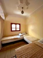 Cama en habitación compartida mixta de 6 camas