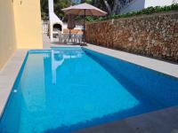 Villa con piscina privada cerca de la playa - B&B Cala Blanca