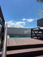 Apartamento Aconchegante com Piscina a 2 Quadras da Beira-Mar - Ferienwohnung Arroio do Sal