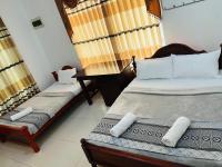Chambre Triple avec Salle de Bains Privative