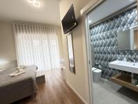 Chambre Deluxe (2 Adultes + 1 Enfant)