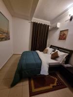 Cocon rénové - bordure route - centre bonamoussadi - Chambres d’hôtes Douala