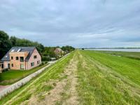 Deichkoje12 Deck 1 EG direkt am Eiderdeich nur 7 km bis zur Nordsee und 20 Min bis Sankt Peter Ording - Chambres d'hôtes Tönning