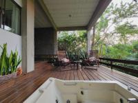 Suíte no Jardim, varanda com hidro, praia do Engenho d água Ilhabela - Bed and Breakfast Ilhabela