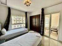 Three-Bedroom Apartment with Balcony