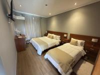 Chambre Triple - Vue sur Jardin