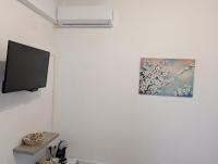 Camera Matrimoniale/Doppia con Letti Singoli con Vista Giardino