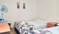 Zweibettzimmer mit Bad