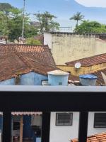 apartamento martim de sá 2 dormitórios pé na areia 24 A tony - Chambres d’hôtes Caraguatatuba