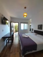 Tweepersoonskamer met 1 of 2 Bedden en Uitzicht op de Tuin