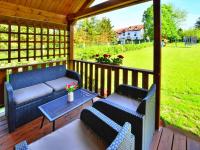 Holiday homes with terraces, large garden - Ferienwohnung Henkenhagen