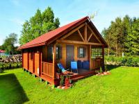 Holiday homes with terraces, large garden - Ferienwohnung Henkenhagen