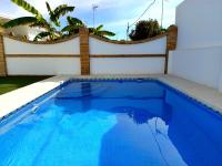 Chalet adosado con piscina privada en Mazagón - B&B Moguer