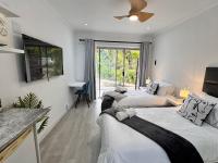 Chambre Double ou Lits Jumeaux Deluxe – Vue sur Jardin