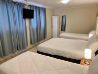 Camera Familiare con Bagno in Comune