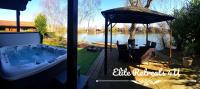 Elite Retreats 4U Lakeside Hot Tub Log Cabin with the fishing peg at Tattershall Lakes Park - B&B Tattershall