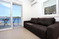 One-Bedroom Apartment with Balcony and Sea View