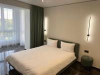 Сучасні апартаменти в новому ЖК Great House,район автовокзалу,центр,поруч обласна лікарня,парковка,автономне опалення,два окремі місця - Chambres d’hôtes Rivne