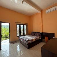 Sunrise Bukit Asam Home Stay - B&B Katilampak