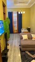 Bleezy Appartment - Chambres d'hôtes Dar es Salam
