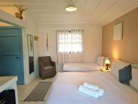 Habitación Triple con vistas al jardín