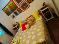 Dreibettzimmer mit Gartenblick