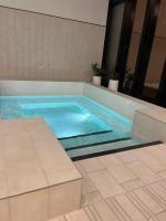 2bedroom city central appletv Homepod pool sauna - Chambres d'hôtes Melbourne
