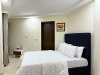 Chic Turquoise Apt - Self Checkin , Imtiaz Mall & Dining - Chambres d’hôtes Lahore