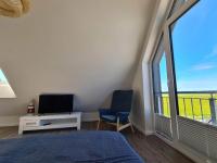 Deichkoje - Ferienwohnung Westerdeichstrich