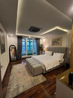 Modern 1 Bed Suite with Balcony Goldcrest Mall DHA Phase 4 - B&B Lahore