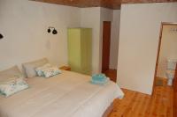 Kamer met Kingsize Bed en Uitzicht op de Bergen