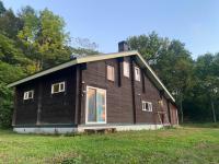 large log cabin 桜 - Chambres d’hôtes Toyoura