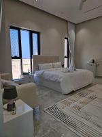 Chambre Double Deluxe - Vue Latérale sur Mer