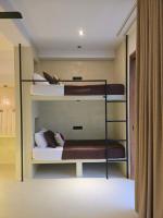 Camera Quadrupla con Vista Giardino 