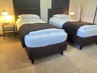 Camera Superior Doppia con Letti Singoli con Vista Giardino