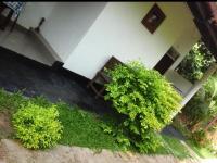 Camera Tripla con Vista Giardino