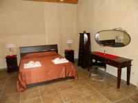 Chambre Double Deluxe (2 Adultes + 1 Enfant)