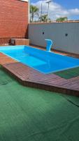Casa com piscina - B&B Tramandaí