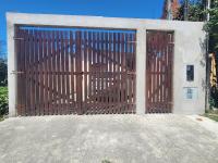 Casa aconchegante com piscina, churrasqueira e garagem, próximo à Praia das Palmeira - B&B Caraguatatuba