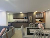 BG - Apartamento alto padrão à beira-mar em Bertioga - B&B Bertioga