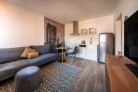 One-Bedroom Apartment with Balcony and City View