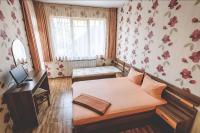 Camera Tripla con Vista Giardino