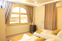 Tweepersoonskamer met 1 of 2 Bedden en Uitzicht op Zee