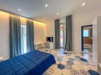 Chambre Lit Queen-Size - Vue sur Jardin