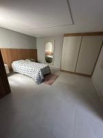 Casa grande com jardim - B&B Capão da Canoa