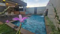 casa com piscina e hidro bem localizada - Ferienwohnung Dourados