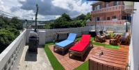 Sunkissed Divers Okinawa 1, Rooftop for 2 with Jacuzzi, Bbq and Sea View - B&B Yomitan